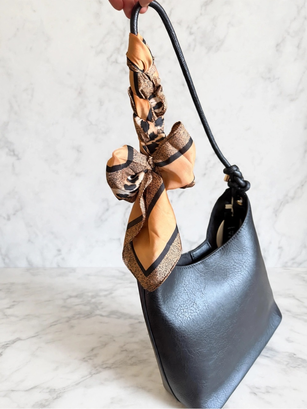 Classic Black Leather Shoulder Bag with Decorative Scarf